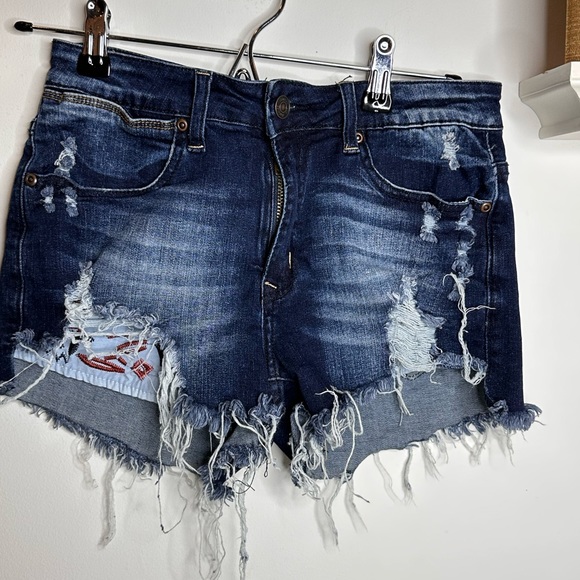 Pants - Distressed denim shorts